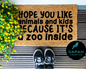 Hope you like animals and kids because it's a zoo inside Doormat